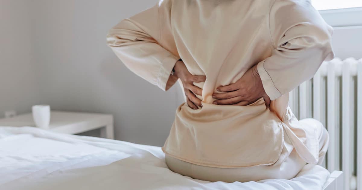 Grieperig én rugpijn? Het kan een waarschuwing van je nieren zijn