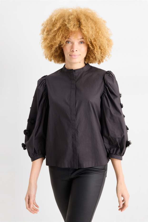 Deze blouse van C&A (€17,99) wil je aan met kerst